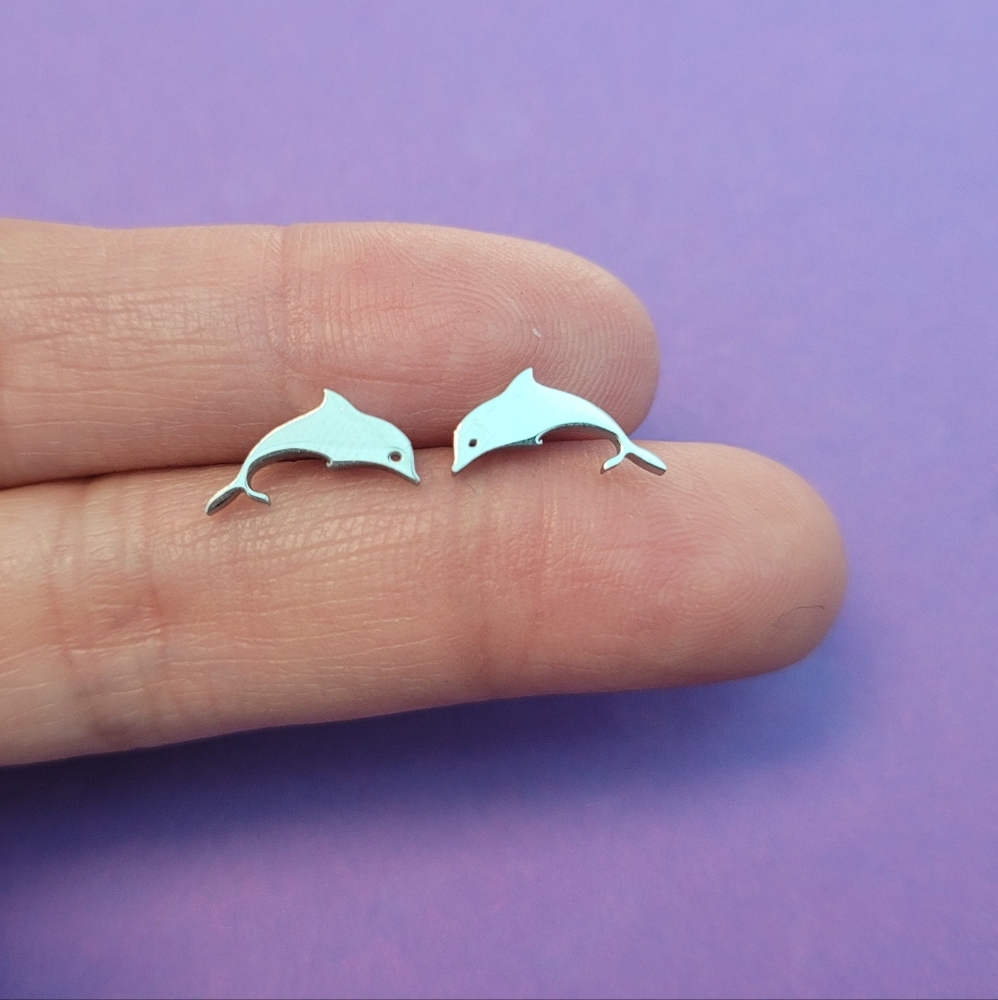 Super cute, unique dolphin shaped silver stainless steel stud earrings